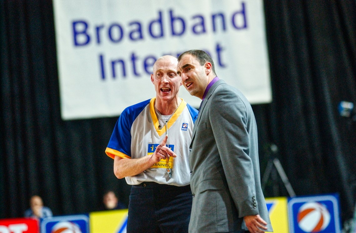 A photograph of Roger Harrison and English basketball coach Tony Garbelotto